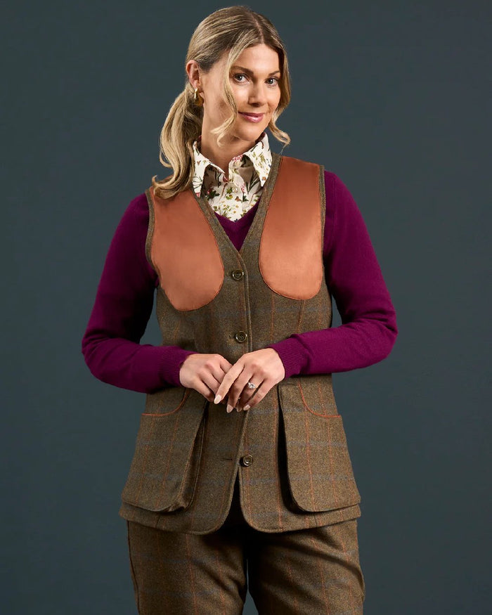 Willow coloured Alan Paine Combrook Ladies Tweed Shooting Waistcoat on indoor background #colour_willow