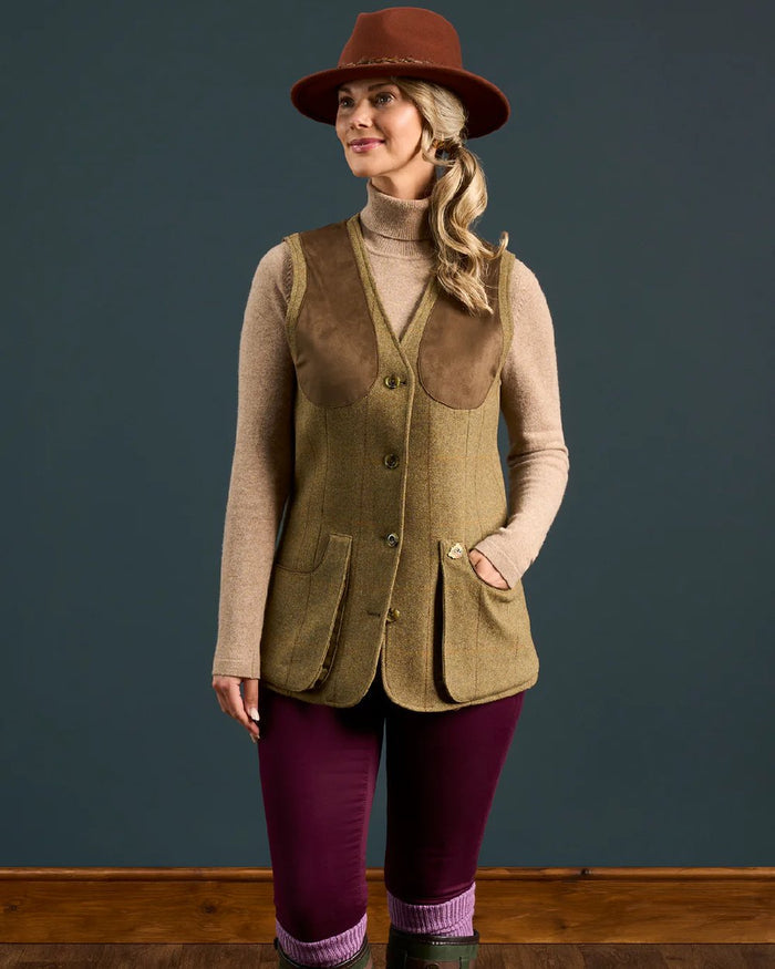 Grove coloured Alan Paine Combrook Ladies Tweed Shooting Waistcoat on indoor background #colour_grove