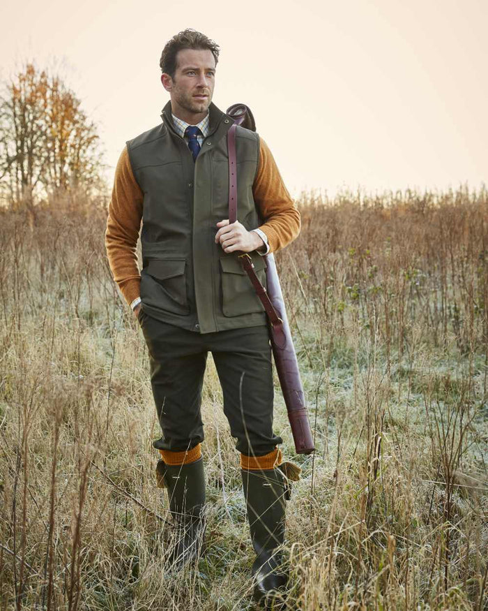 Olive coloured Alan Paine Lockwood Mens Shooting Waistcoat on field background #colour_olive