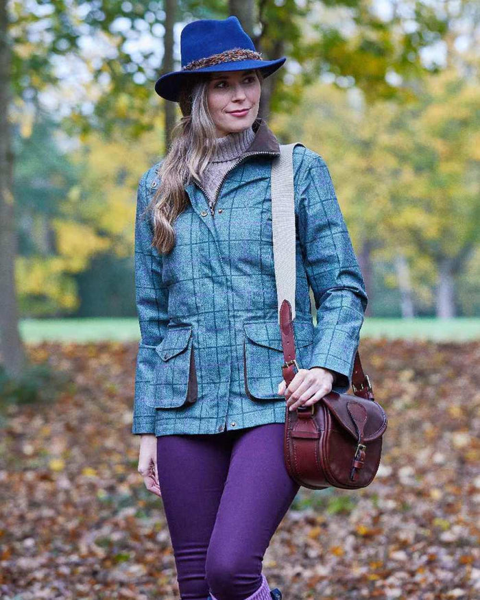 Seagrass coloured Alan Paine Womens Didsmere Coat on forest background #colour_seagrass