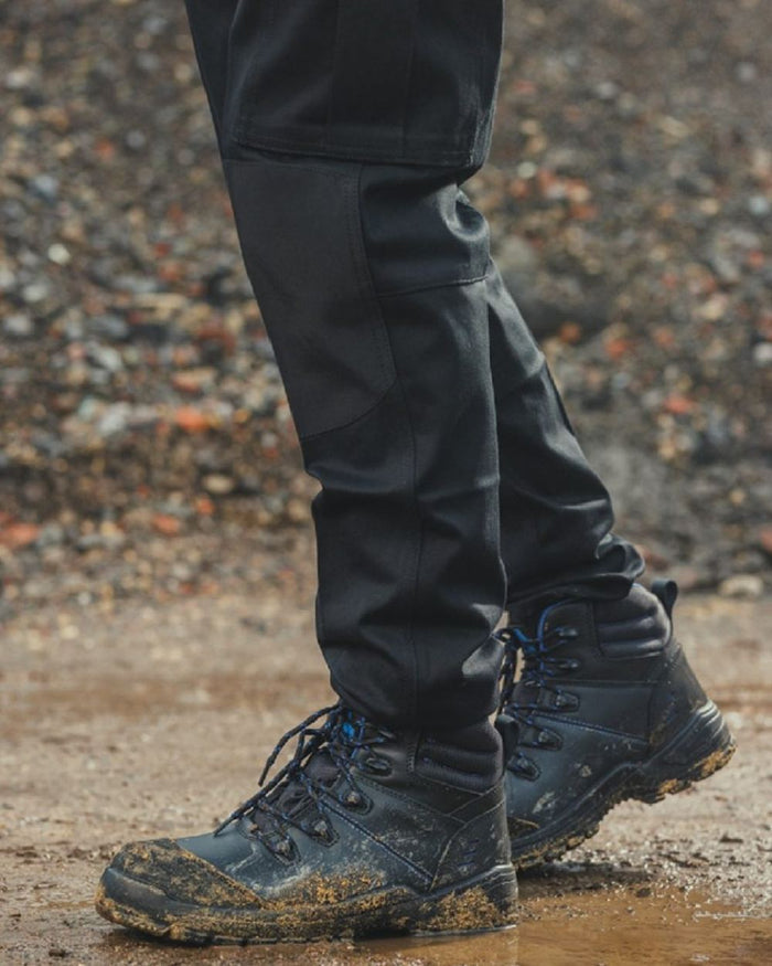 Black coloured Amblers Safety AS308C Waterproof Safety Boots on mud background #colour_black