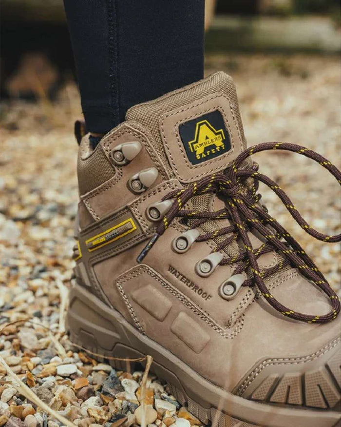 Stone coloured Amblers Safety AS965C Stone Safety Boots on tiny stones background #colour_stone