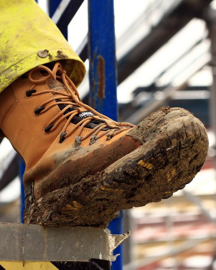 Honey coloured Amblers Safety Mens FS998 Waterproof S3 SRC Safety Boots on blurry background #colour_honey