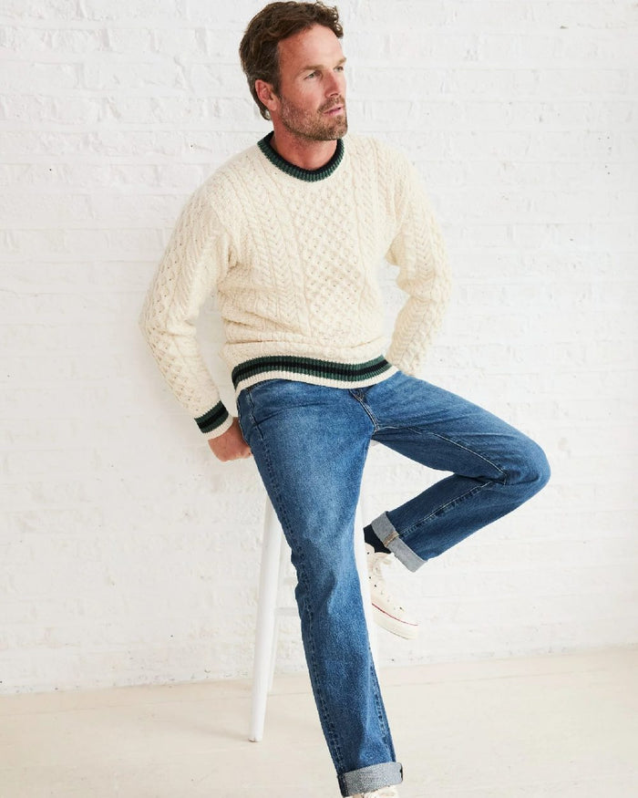 Cream Coloured Aran Mens Inishbeg Stripe Crewneck Merino Sweater on indoor background #colour_cream