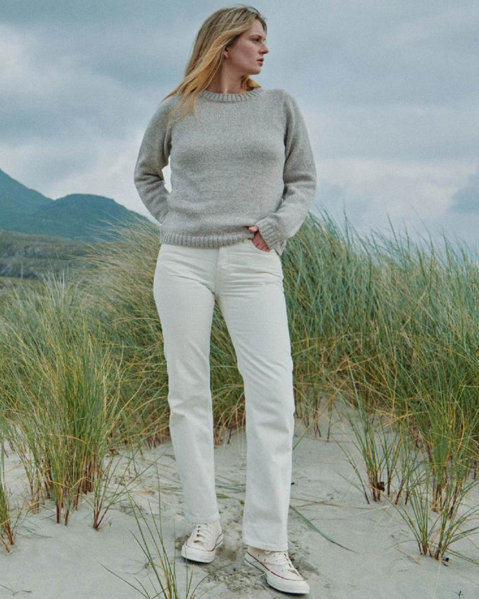 Oat Coloured Aran Womens Aoife Supersoft Crewneck Sweater on outdoor background #colour_oat
