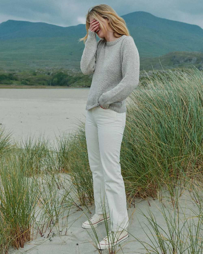 Oat Coloured Aran Womens Aoife Supersoft Crewneck Sweater on outdoor background #colour_oat