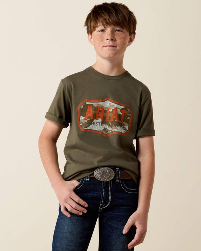 Green coloured Ariat Wild Creek Camo T-Shirt on beige background #colour_green