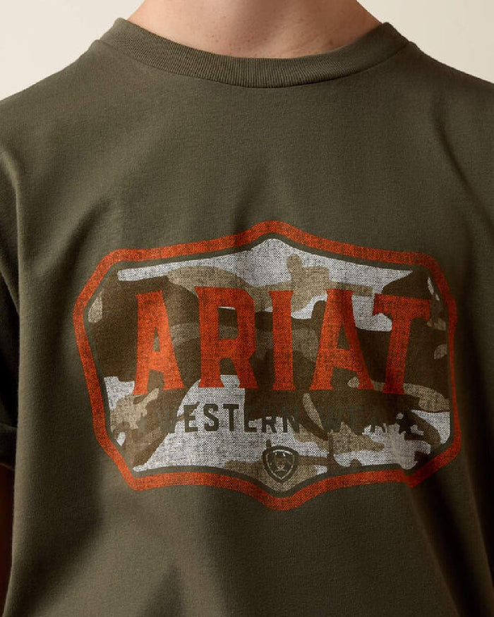 Green coloured Ariat Wild Creek Camo T-Shirt on beige background #colour_green
