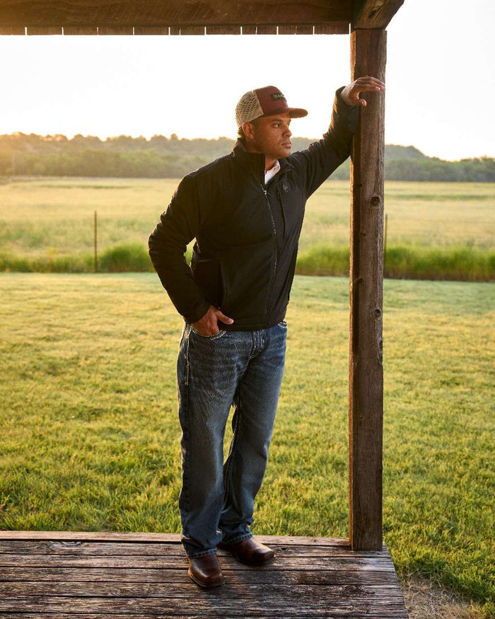 Barn Brown Coloured Ariat Mens Midtown Rambler Western Boots on countryside background #colour_barn-brown