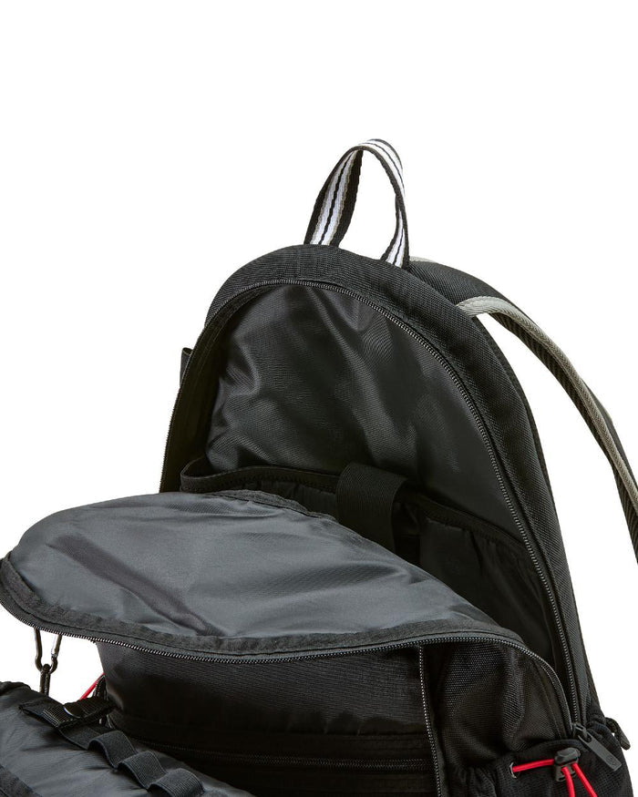 Black coloured Ariat Stride Backpack on white background #colour_black