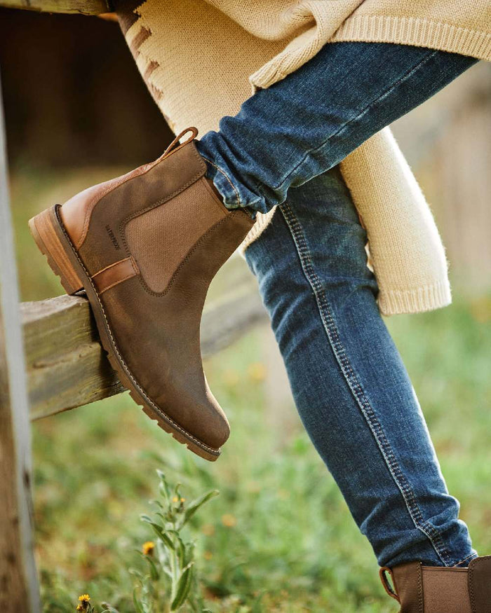 Java coloured Ariat Womens Wexford Waterproof Boots on grass background #colour_java