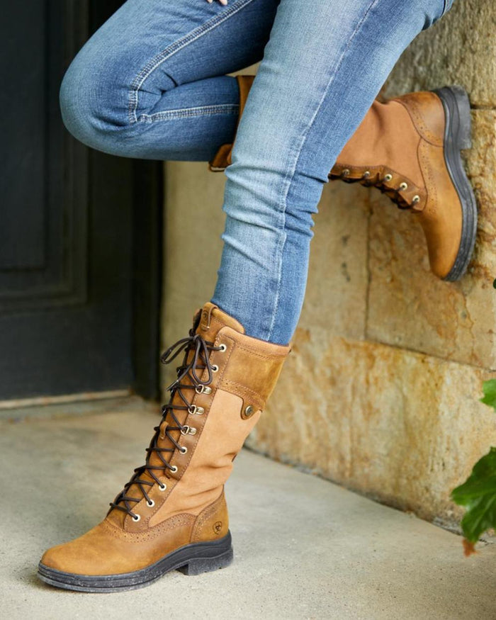 Weathered Brown Coloured Ariat Womens Wythburn II Waterproof Boots On A House Background #colour_weathered-brown