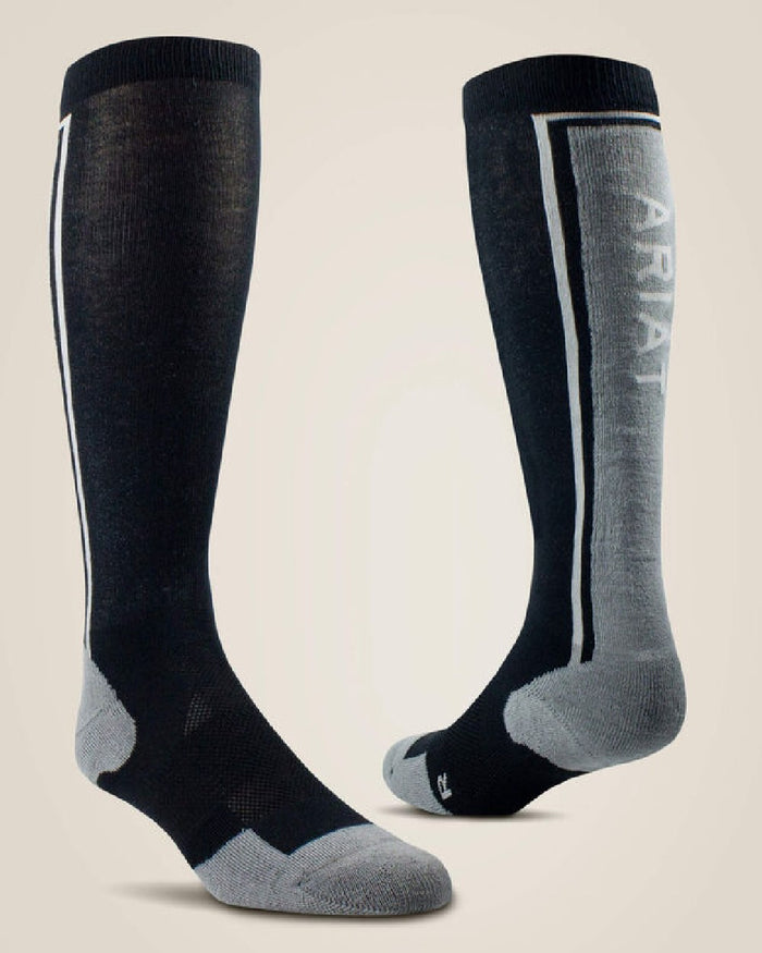 Black colored AriatTEK Winter Slimline Sock on beige background #colour_black