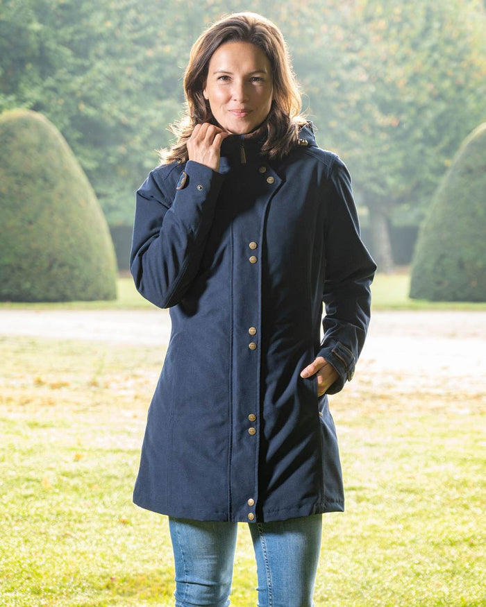 Dark Blue Coloured Baleno Brooklands Waterproof Coat on land background #colour_dark-blue