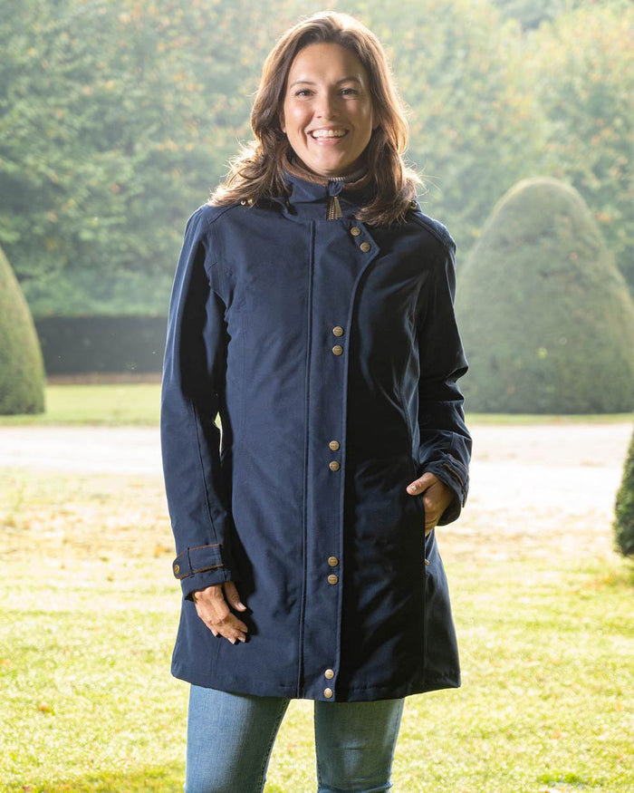 Dark Blue Coloured Baleno Brooklands Waterproof Coat on land background #colour_dark-blue