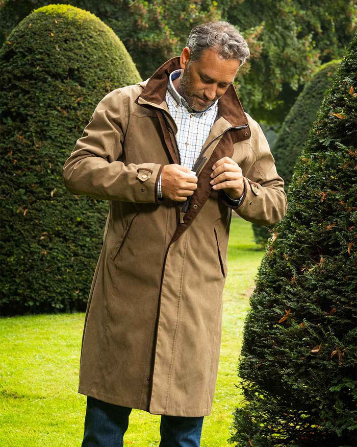 Camel Coloured Baleno Mens Cameron Fashionable Country Coat on garden background #colour_camel