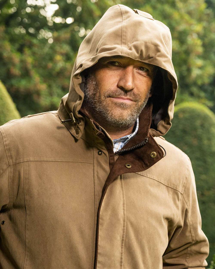 Camel Coloured Baleno Mens Cameron Fashionable Country Coat on garden background #colour_camel