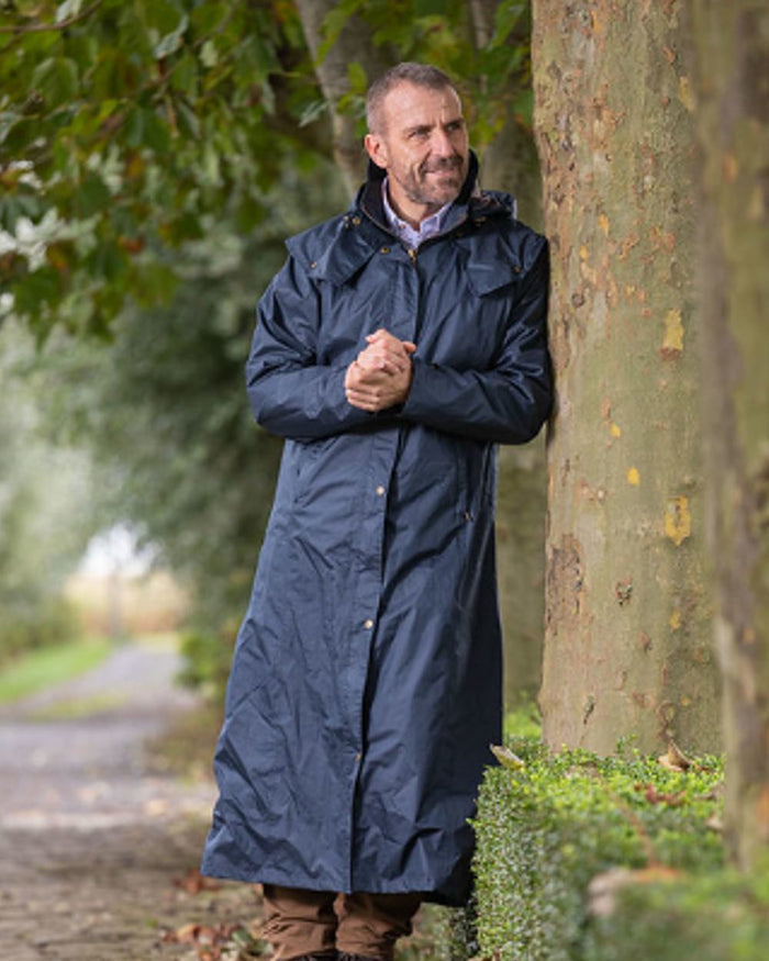 Navy Blue Coloured Baleno Newbury Waterproof Long Coat On A Street Background #colour_navy-blue