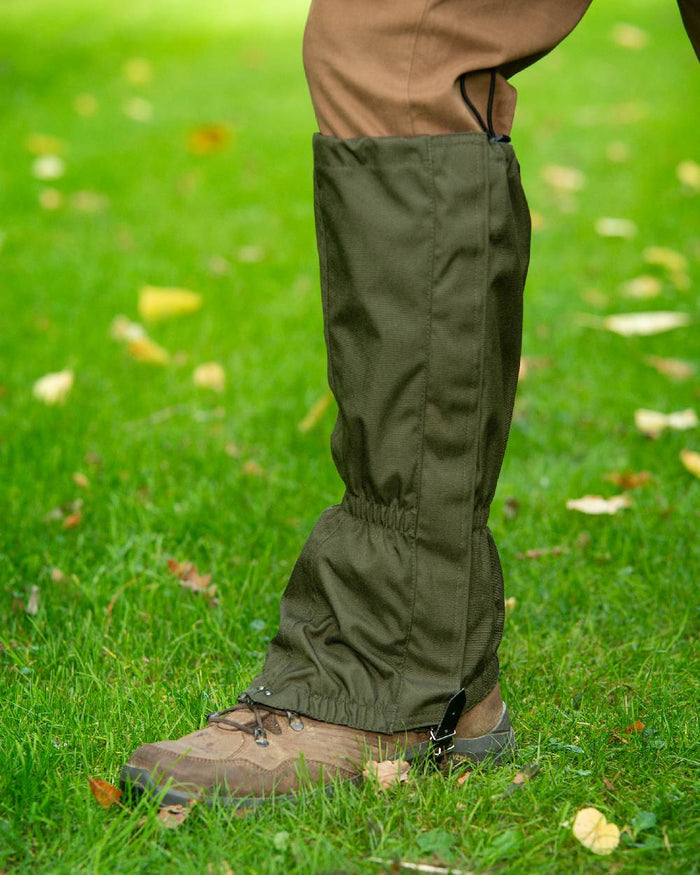 Green Khaki Coloured Baleno Toronto Hydura Gaiters on grass background #colour_green-khaki