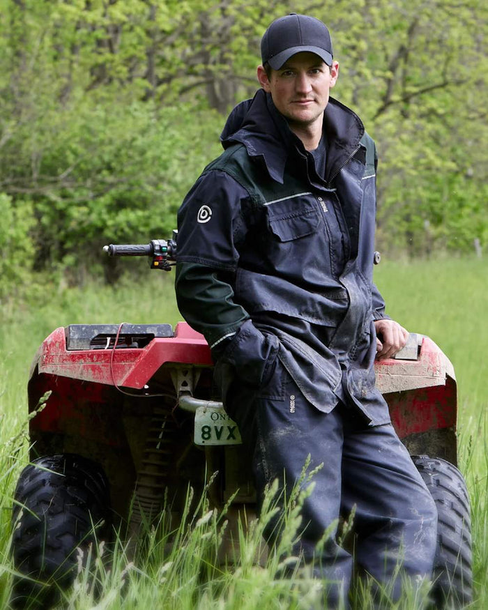 Black Moss coloured Betacraft ISO940 Eco Elite Parka on outdoor background #colour_black-moss