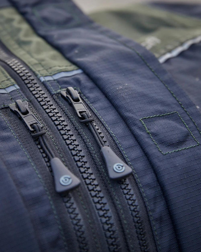 Black Moss coloured Betacraft ISO940 Eco Elite Parka on outdoor background #colour_black-moss