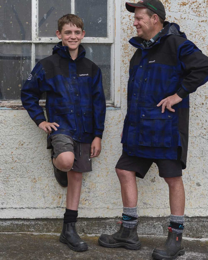 Blue Black Coloured Betacraft Mens Heritage Jacket on outdoor background #colour_blue-black