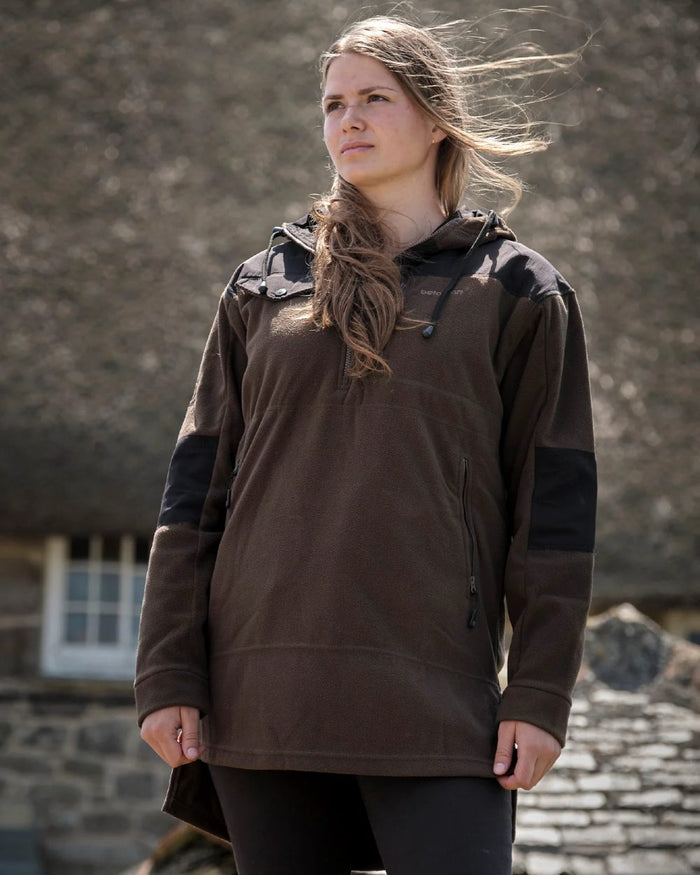 Olive coloured Betacraft Quest ECO Fleece Bush Shirt on outdoor background #colour_olive