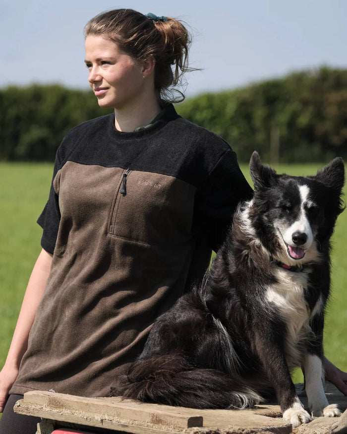 Olive coloured Betacraft Quest ECO Fleece T-Shirt on grass background #colour_olive