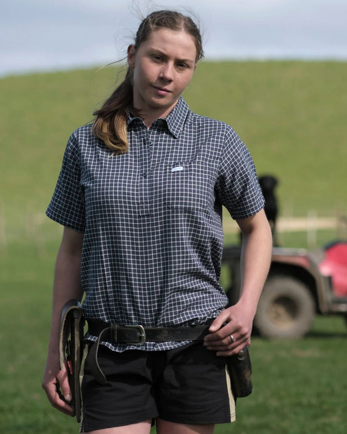 Dark Navy Cool Blue coloured Betacraft Station Shorts 3 on farm background #colour_dark-navy-cool-blue