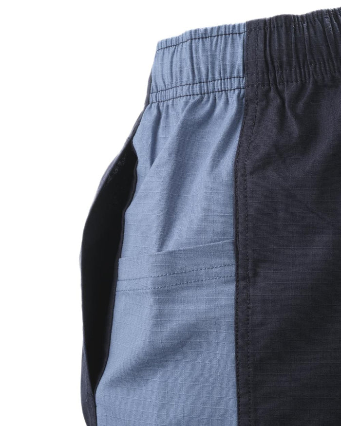 Dark Navy Cool Blue coloured Betacraft Station Shorts 3 on white background #colour_dark-navy-cool-blue