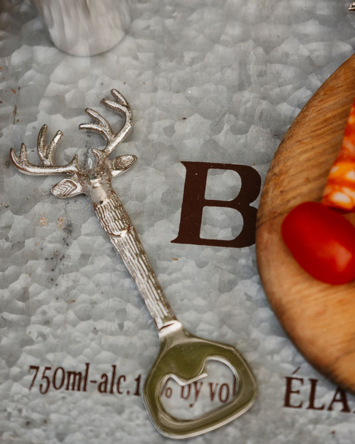 Stag Style Bisley Bottle Opener Stainless Steel on table background #style_stag