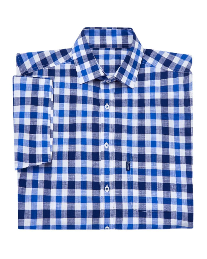 Blue coloured Champion Holkham Short Sleeved Shirt on white background #colour_blue