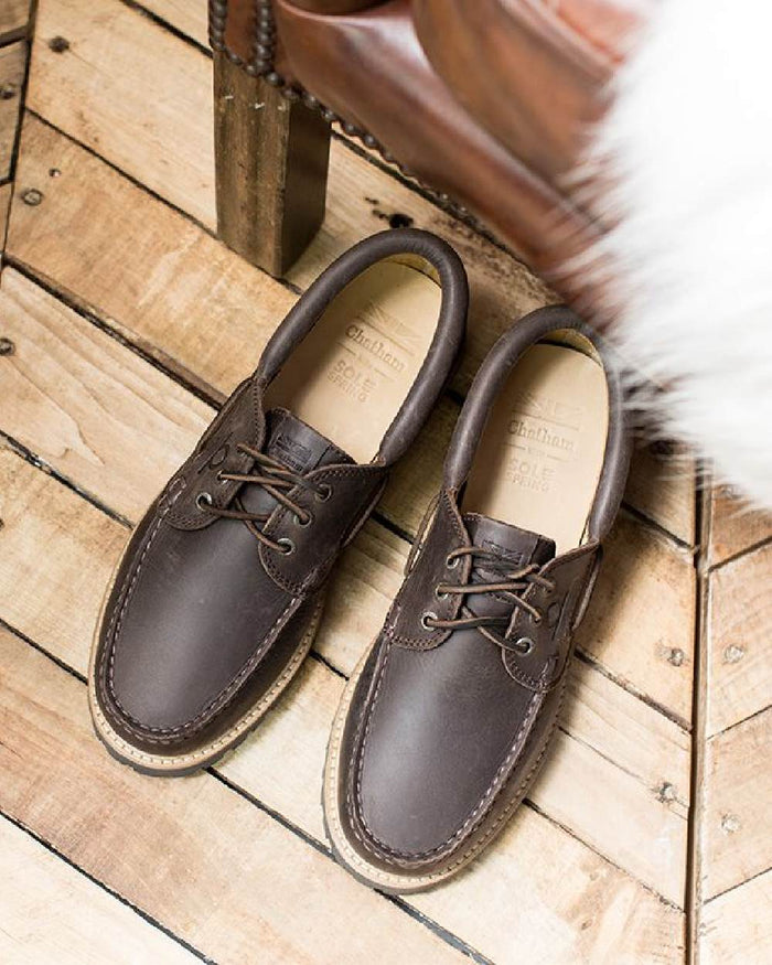 Dark Brown Coloured Chatham Mens Sperrin-Winter Boat Shoes on floor background #colour_dark-brown