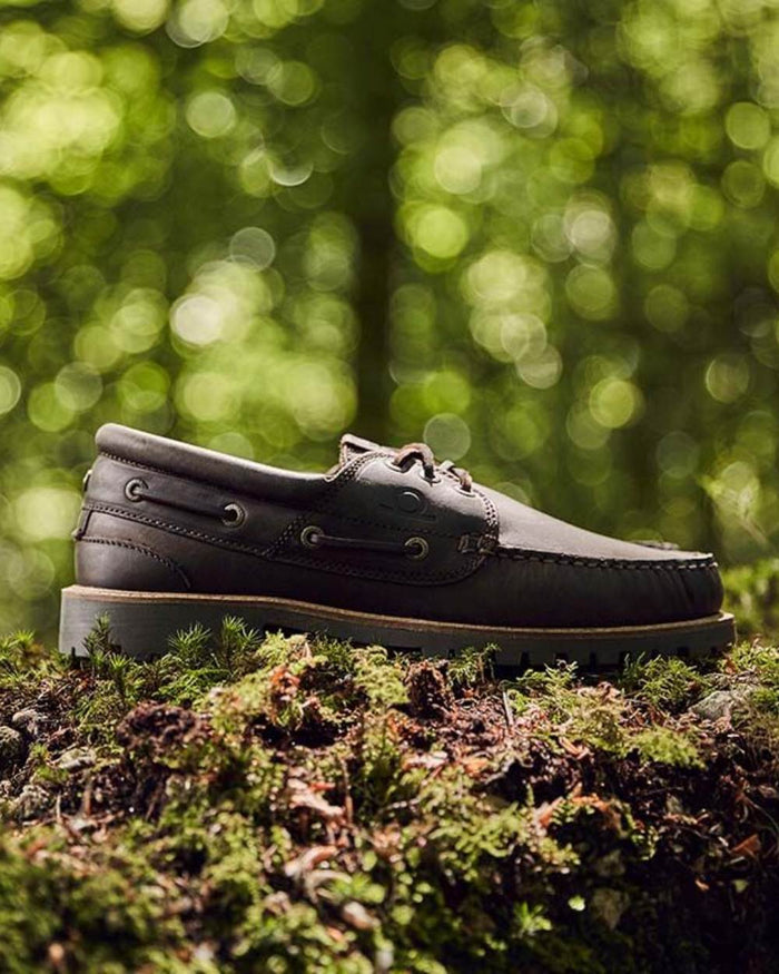 Dark Brown Coloured Chatham Mens Sperrin-Winter Boat Shoes on forest background #colour_dark-brown
