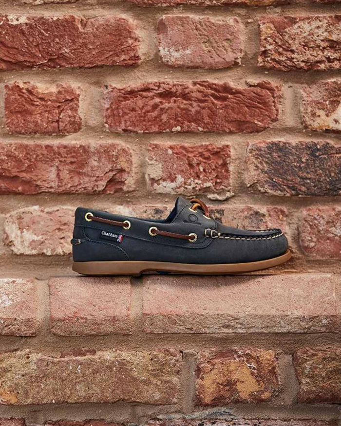 Blue Coloured Chatham Womens Deck II G2 Premium Leather Boat Shoes on wall background #colour_blue