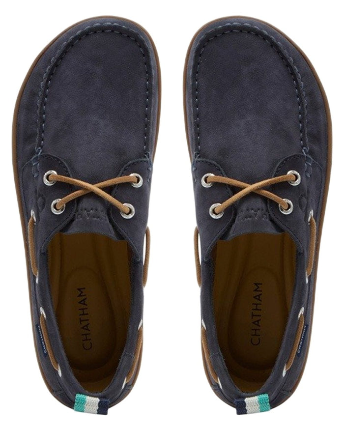 Navy coloured Chatham Womens Eclipse Nubuck Barefoot Boat Shoes on white background #colour_navy