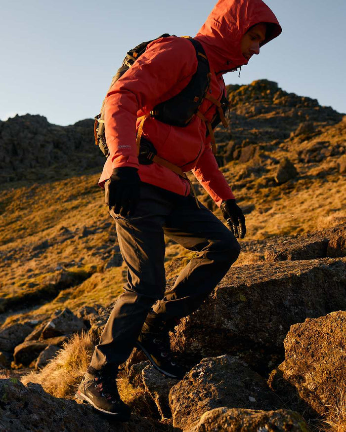 Black Coloured Craghoppers Mens Kiwi Pro III Trousers on outdoor background #colour_black