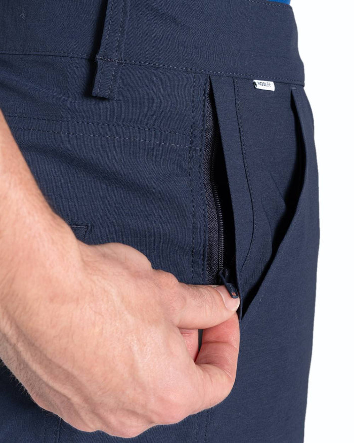 Blue Navy coloured Craghoppers Mens NosiLife Santos Golf Trousers II on white background #colour_blue-navy