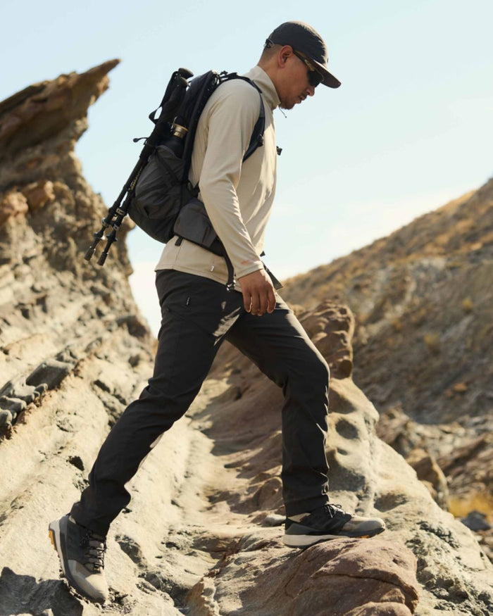 Parchment coloured Craghoppers Mens NosiLife SolarShield+ Half Zip Top on mountain background #colour_parchment