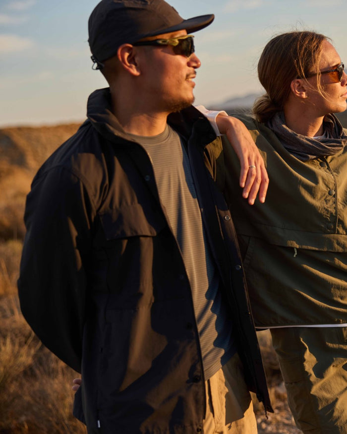 Dark Pewter coloured Craghoppers Mens NosiLife SolarShield+ Long Sleeved T-Shirt on mountain background #colour_dark-pewter