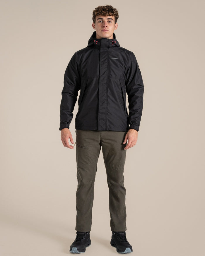 Black coloured Craghoppers Ossus Jacket on beige background #colour_black