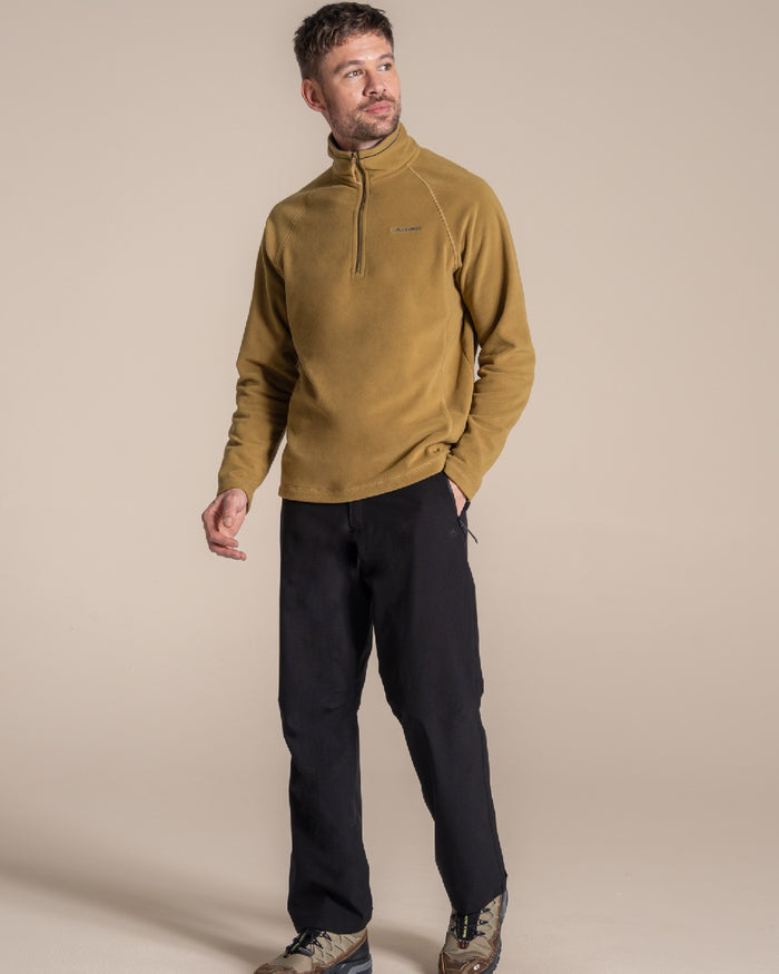 Black colour Craghoppers Steall Pro Thermo Waterproof Trouser on beige background #colour_black