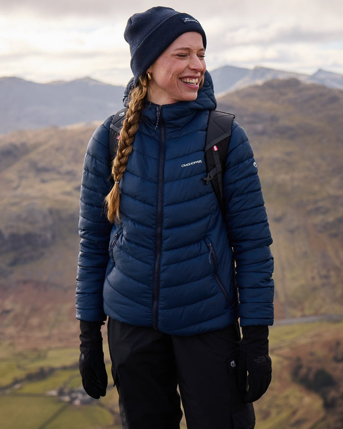 Blue Navy coloured Craghoppers Womens Compresslite IX Hooded Insulating Jacket on mountain background #colour_blue-navy