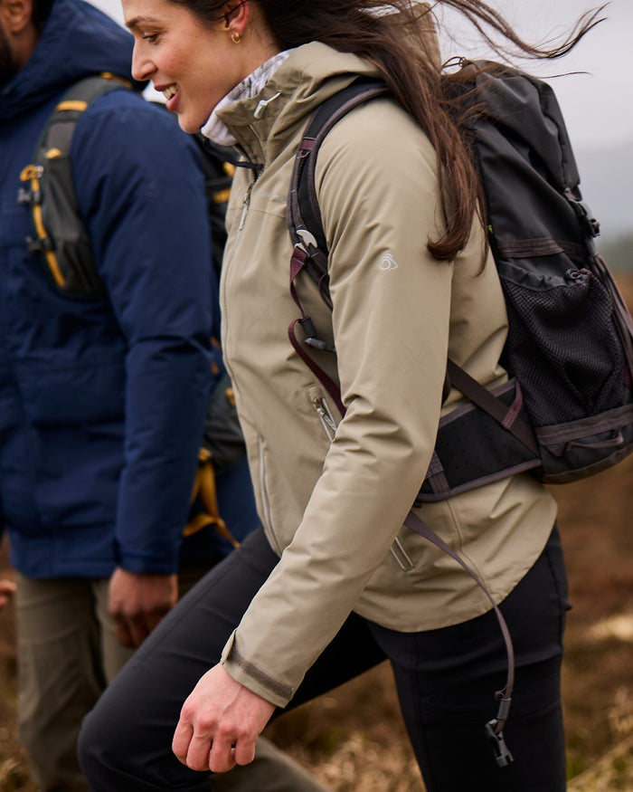 Black coloured Craghoppers Womens Kiwi Pro Cargo Trousers on mountain background #colour_black