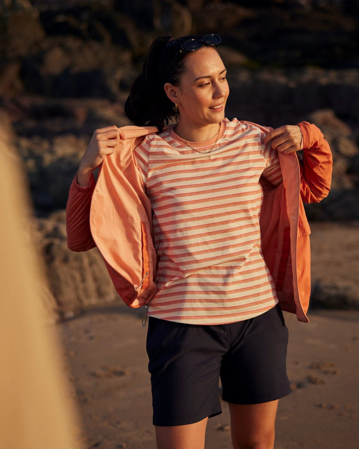 Clay Stripe coloured Craghoppers Womens NosiLife Akona Long Sleeved Top on beach background #colour_clay-stripe