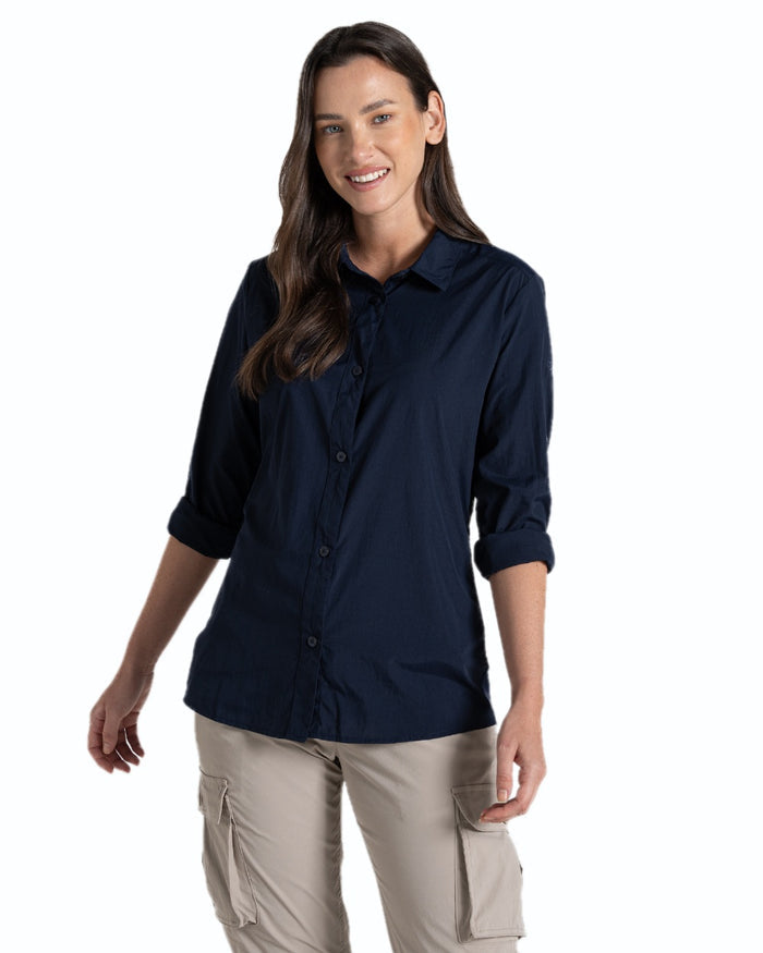 Blue Navy coloured Craghoppers Womens NosiLife Freeda Long Sleeved Shirt on white background #colour_blue-navy