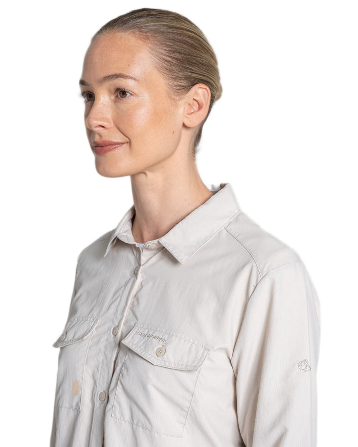 Oyster coloured Craghoppers Womens NosiLife Loukkos Long Sleeved Shirt on white background #colour_oyster