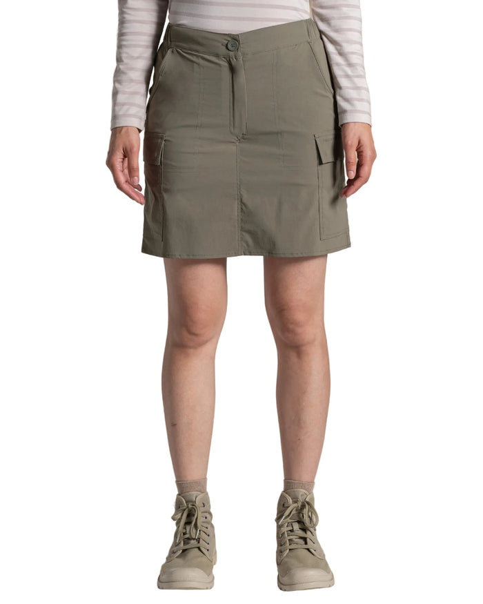 Wild Olive coloured Craghoppers Womens NosiLife Pro Cargo Skort on white background #colour_wild-olive