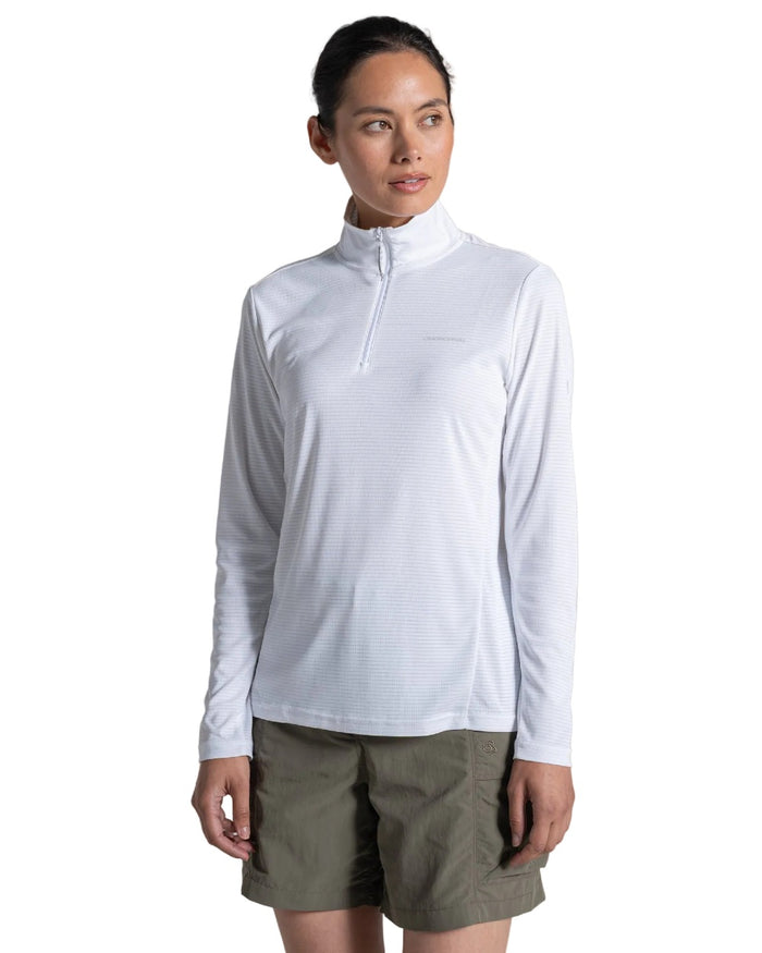 White coloured Craghoppers Womens NosiLife SolarShield+ Half Zip Top on white background #colour_white