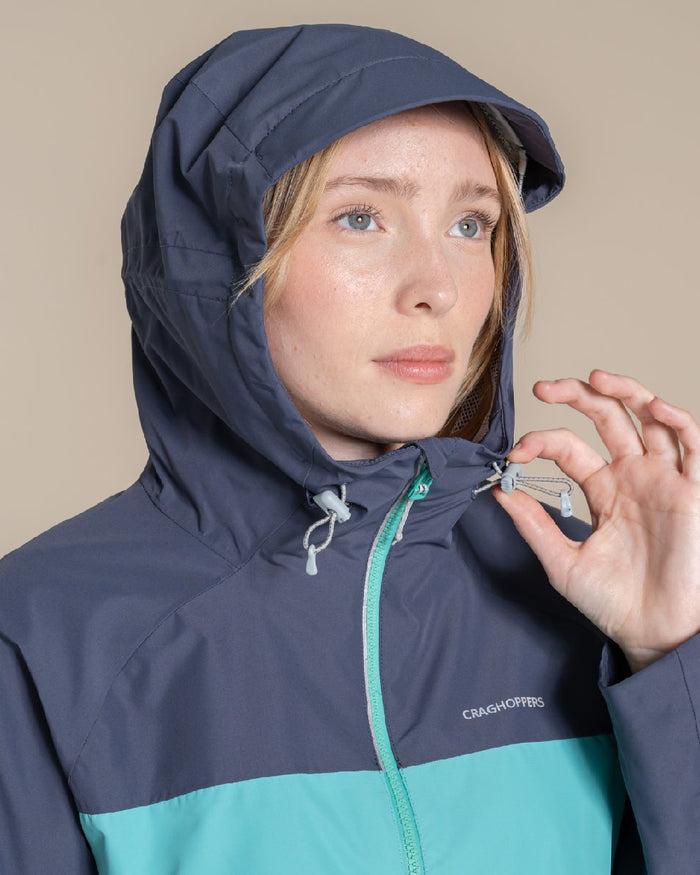 Glazed Aqua Anthracite coloured Craghoppers Vanth Jacket on beige background #colour_glazed-aqua-anthracite